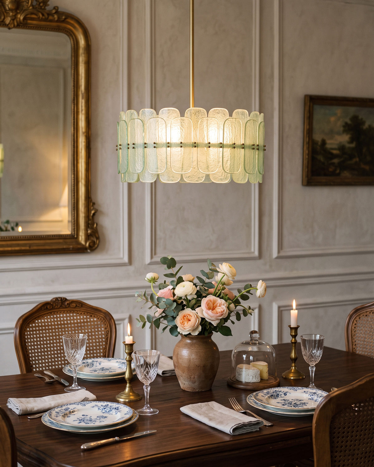 Tressa Glass Chandelier hanging over a table